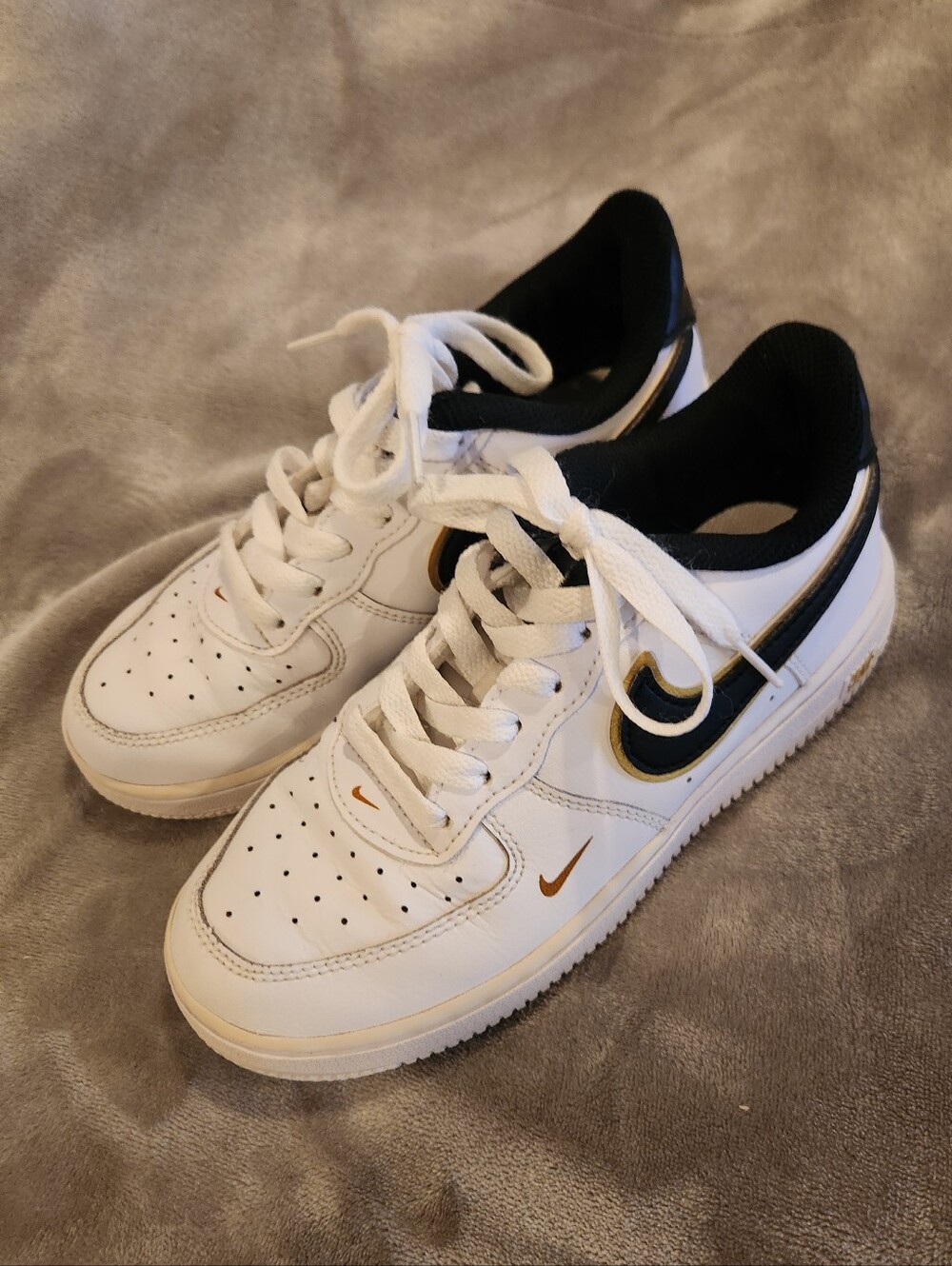 Nike Kid’s White & Black Low-Top Air Force 1 Sneakers with Gold Accents, Size 1Y